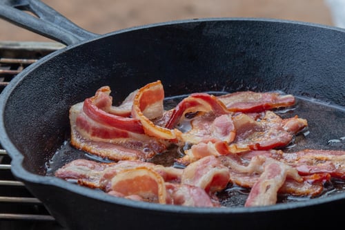 bacon in a frying pan