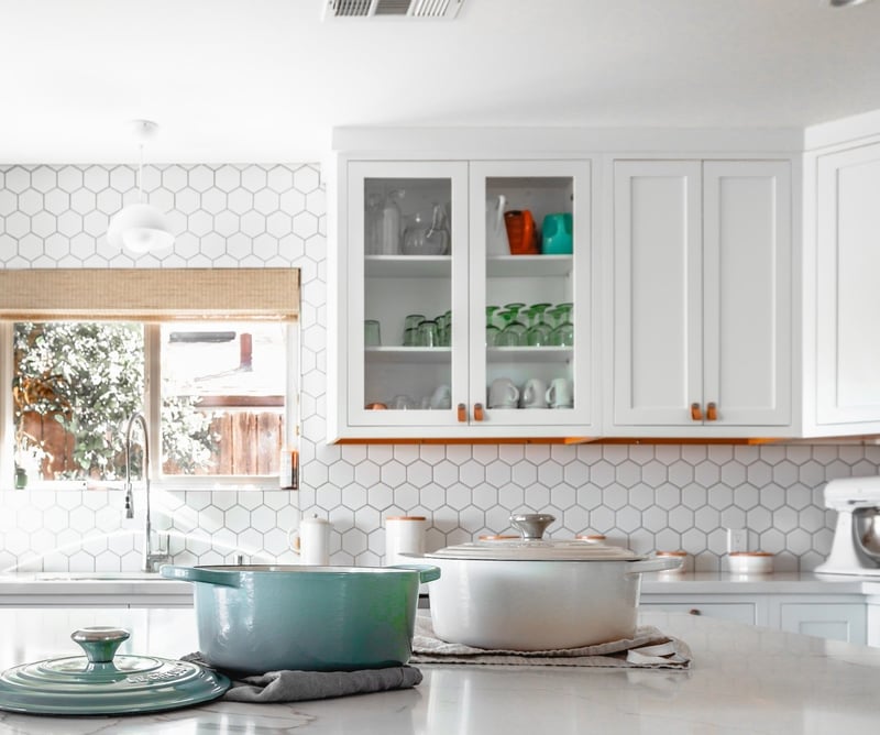 clean aesthetic kitchen with dutch oven on counter