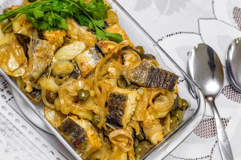 Delicious and traditional portuguese codfish with potatoes